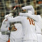 AS Roma's players celebrate after Brighi scored against CFR Cluj during their Champions League soccer match in Cluj