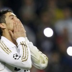 Real Madrid's Ronaldo reacts after his penalty shot was blocked during their Champions League soccer semi-final in Madrid