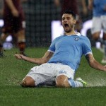 Lazio's Candreva celebrates after scoring against AS Roma during their Serie A soccer match in Rome