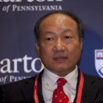 Chen Feng, chairman of Hainan Airlines, speaks at the Wharto