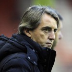 Manchester City's coach Mancini reacts ahead of their English Premier League soccer match against Sunderland in Sunderland