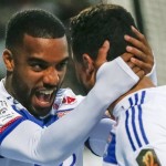Olympique Lyon's Fekir and Lacazette celebrate after scoring a goal against Girondins Bordeaux during their French Ligue 1 soccer match at the Gerland stadium in Lyon